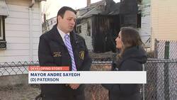 2 buildings to be demolished is Paterson following a fire, officials monitoring a third News Clip