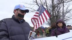 North Carolina residents rally outside Trump event Instructional Video