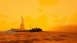 Statue of Liberty with ships sailing, Manhattan, New York City against sunrise fog Stock Footage