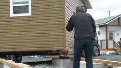 WATCH | N.B. tiny home village complete after ‘cranking out’ a house a week for 2 years News Clip