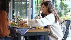 christmas eve party dinner gruop of caucasain and asian friends drink and conversation together with happiness and joyful wonderful moments Stock Footage