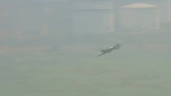RAF Hurricane plane flying above excavation near the Thames Estuary News Clip