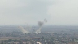 CLEAN : Thick black smoke covers Syrian city of Ras al-Ain News Clip