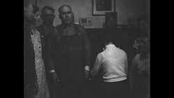 During Great Depression, farmer somewhere in Midwestern US singing song in support of Farmers' Holiday Association News Clip