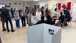 A practice voting day helps newcomers get ready for the real thing News Clip