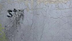 stressfree life word carved in a grey wall Stock Footage