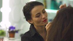 Beautiful young girl in a beauty salon Stock Footage