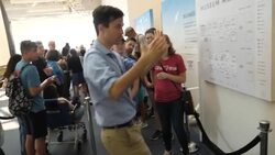 People queuing to view Neil Armstrongs spacesuit News Clip