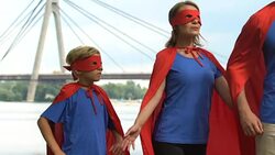 Superhero parents and kid ready for adventure, family support and togetherness Stock Footage