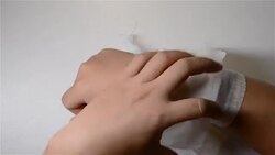 taking out the wrapping bandages for a hurt hand Stock Footage