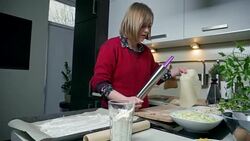 Young woman baking Stock Footage