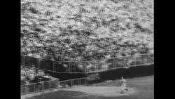 United States, c.1951: Joe DiMaggio kicks the dirt after the ball he hits is caught by the opposing team Stock Footage