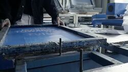 Fashion designers screen t-shirt, working at workspace Stock Footage