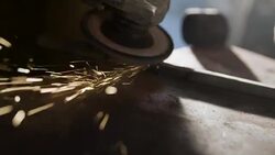 Grinding metal with electric grinder Stock Footage