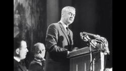 Man from Broadcasting Industry Talks to Audience from Podium Stock Footage