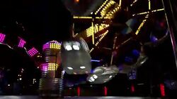 Colorful spinning wheel in amusement park at night Stock Footage