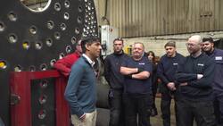 Rishi Sunak helps wire up a boiler during visit to Keighley News Clip
