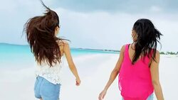 Portrait of multi ethnic female on ocean beach Stock Footage