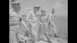US military officers escorted to helicopter by MPs on second day of Korean War truce talks in Panmunjom, North Korea, 1953 News Clip