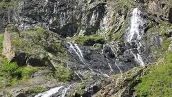 View waterfall scenes in mountains, national park Dombai, Caucasus, Russia Stock Footage