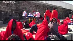 Brussels plans cash sweetener to share migrant load News Clip