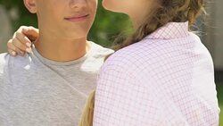 Young people embracing outdoors, pure relations, happiness and romance, closeup Stock Footage