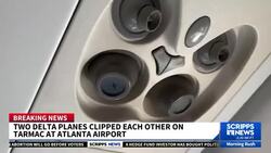 Planes collide while taxiing Atlanta's airport, loud bangs heard News Clip