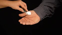 Green Pills Dispensed Into Hand Stock Footage