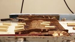 Candy on a Conveyer Belt with Chocolate Coating Stock Footage