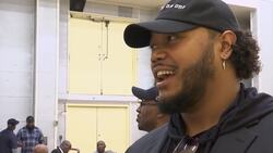 NFL players trade football for gospel music News Clip