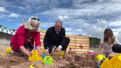 Sir Ed Davey builds sandcastles in Devon News Clip