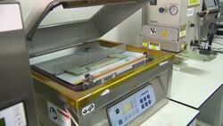 Lab technicians working on Lithium Sulphur batteries News Clip