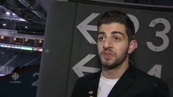 Syrian refugees see hockey in Halifax News Clip