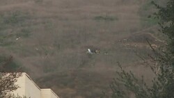 CLEAN : Authorities prepare body bags at Kobe Bryant helicopter crash site News Clip