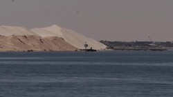 General view of expanded Suez Canal with welcome sign News Clip