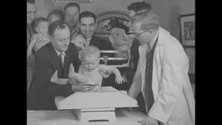 Aspiring fathers learn how to care for babies when Mama isn't around News Clip