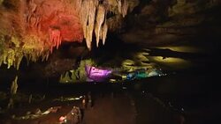Tour to mysterious cave with colorful lights in Caucasian mountains in Kutaisi Stock Footage