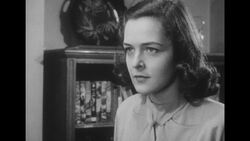 1950s: Angry husband licks lips and speaks Stock Footage