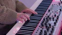 Watch Irish singer Luz perform single 'sustain' on Music Box Instructional Video