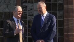 Starmer and Martin talk as they walk through gardens during UK-Ireland Summit News Clip