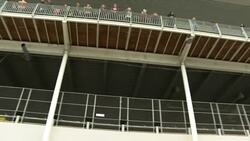 People applauding NHS staff outside NHS Nightingale (Excel Centre) News Clip