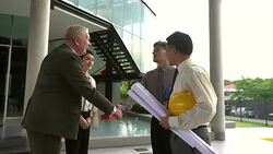 Handshake of businessman demonstrating their agreement to sign agreement or contract between their firms / companies / enterprises. Stock Footage