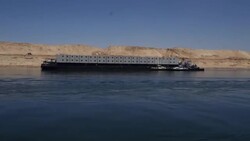 Tracking shot from boat moving on Suez Canal News Clip