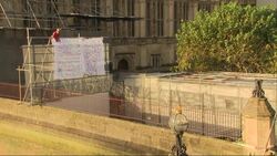 An activist climbed the scaffolding near Big Ben with banners protesting a range of topics, including Tier 3 coronavirus lockdowns News Clip