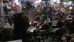 Tattoo artists help cancer survivors in Rio Instructional Video
