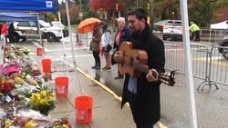 Musician sings at Pittsburgh makeshift memorial Instructional Video