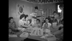 South Koreans in Tokyo donate packages for their countrymen arriving at start of Korean War News Clip