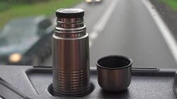 thermos in the background of the car window Stock Footage