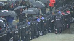 Smoke rising above opposition demo in Albania Instructional Video