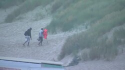 UK: Illegal migrants landing on a beach in Kent. News Clip